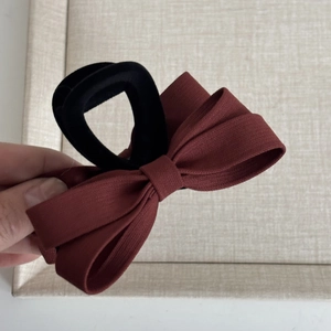 Elegant French burgundy twill bow hair claw clip with gold heart emblem for women