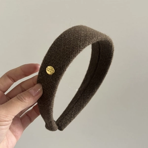 Vintage wide dark brown headband with gold buckle and textured fabric finish