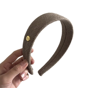 Retro dark brown woven headband with gold decorative button for high cranium style