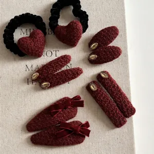 Elegant wine red tweed hair clips and heart scrunchies set with golden accent labels