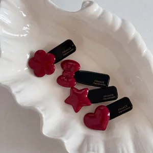 French style red acetate hair clip set with flower, bow, star, and heart shapes