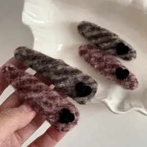 French velvet heart hair clips in dark pink and charcoal grey for autumn and winter styles