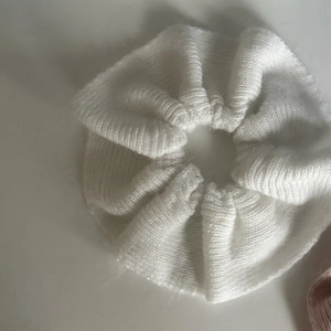 White mohair hair scrunchie with soft knitted texture and fluffy oversized design
