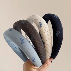 Blue bow striped wide headband collection in light blue, brown, white, and navy colors