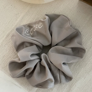 Elegant dark grey satin scrunchie with white love embroidery and high elasticity texture