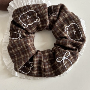 Sweet brown plaid scrunchie with white lace trim and embroidered bear pattern