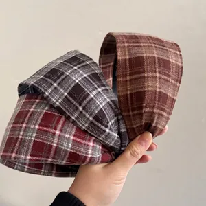 Classic plaid wide headband in red, grey, and brown for a retro preppy style look