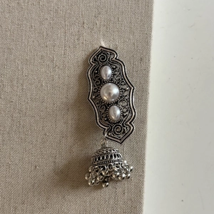 Retro Tibetan silver tassel earrings with delicate hollow flower pattern and white pearls