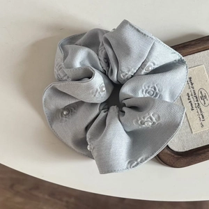 Elegant grey floral scrunchie with 3D camellia embroidery and delicate white pearls