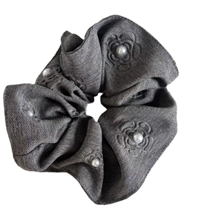 Elegant dark grey floral embossed scrunchie with pearl accent for women hair accessories