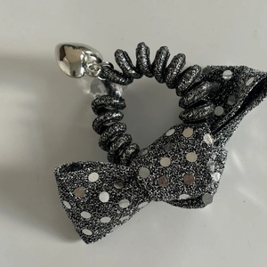 Silver glitter bow hair tie with spiral telephone wire band and heart pendant