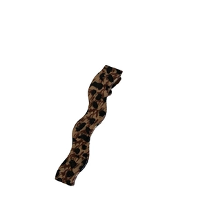 Vintage leopard print wavy hair clip with polished finish and metal spring closure