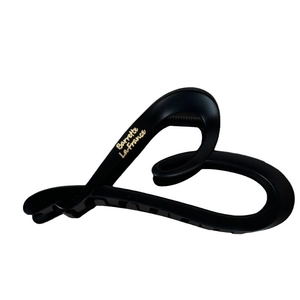 Matte black heart-shaped hair claw clip with golden Barrette La France lettering