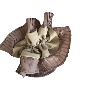 Two-tone pleated leather and lace scrunchie in brown and beige cloud-like design