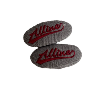 Pair of gray velvet hair clips with red Alline embroidery in minimalist style