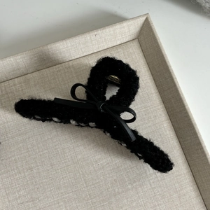 Elegant black plush shark hair clip with leather bow knot and golden metal spring