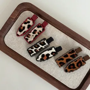 Lot de 6 barrettes à motif léopard en bordeaux, noir et marron avec finition fausse fourrure