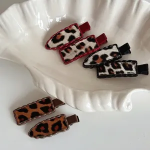 Lot de 6 barrettes à cheveux à imprimé léopard en fausse fourrure sur plateau coquillage