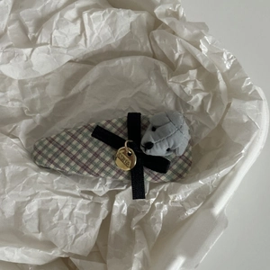 Cute plaid hair clip featuring a plush puppy mascot and a golden Luna charm detail