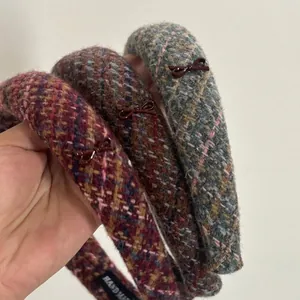 Thick colorful tweed padded headbands with small bow accents and handmade labels
