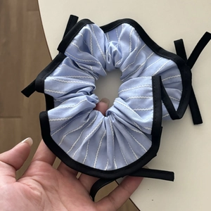 Blue and white striped bow scrunchie with black trim and long ribbon ties for women