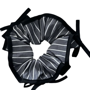 Blue and white striped scrunchie with oversized bow design for elegant low ponytails
