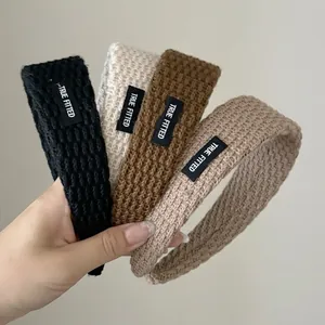 Chic knitted wide headband set in four neutral colors with True Fitted label design