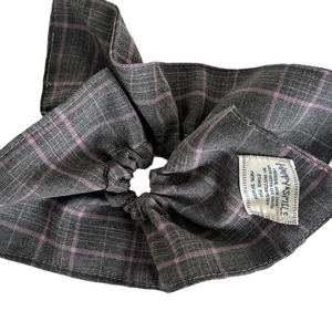 Pink and grey plaid scrunchie with long ribbon bow and side textile label