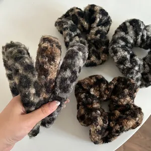Set of 4 plush faux shearling leopard print scrunchies in stylish brown and grey patterns