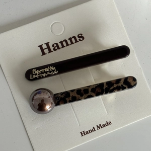 French leopard and chocolate brown hair clip set with pearl and gold lettering on card