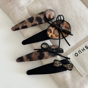 Vintage leopard print and black bow hair clip set with elegant pearls for women