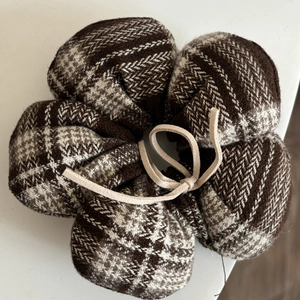 Brown and beige plaid fabric hair scrunchie with a pumpkin flower shape and ribbon tie