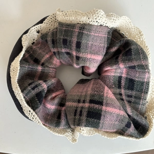 Pink and blue plaid scrunchie with lace trim edges and vintage aesthetic hair tie