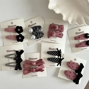 Lot de barrettes à pois roses et noirs en velours côtelé avec décorations de perles