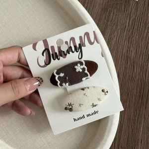 Floral fabric hair clip set with lace and vintage print on branded handmade card
