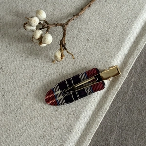 Classic burgundy plaid bow hair clip in acetate fiber for festive Christmas styling