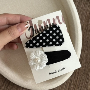 Detail of crochet flower hair clip with pearl and polka dot triangle bb clip set