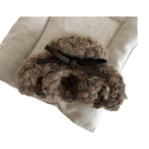 Deep brown plush bow hair claw clip with teddy fur texture and leather bow decoration