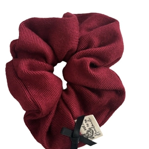 Burgundy ribbed scrunchie with black ribbon bow and handmade label for women