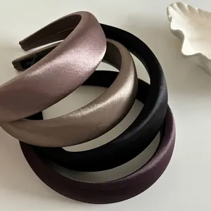 Set of four thick satin headbands in pink, gold, black and burgundy for women hair styling