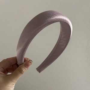 Elegant lavender padded satin headband for women with a smooth and glossy silk texture finish