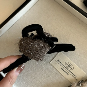 Plush heart hair claw clip with black velvet bow and glittery brown fur detail