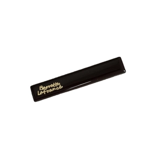 Elegant rectangle coffee brown hair clip with golden French lettering on a white background