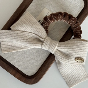 French brown velvet scrunchie with beige ribbon bow and gold Love is Forever metal charm