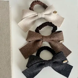 French Retro Knit Bow Hair Scrunchie For Women Ribbed Fabric Elastic Hair Band With Golden Metal Charm Elegant Headwear