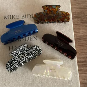 Classic French acetate square hair claws in tortoiseshell and marbled patterns