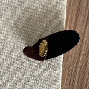 Velvet heart hair clip with gold Make a Wish engraved metal plate in 45-degree view