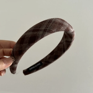 Vintage dark brown plaid thick fabric headband with a handmade label and soft wool texture