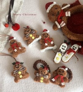 Detailed plush gingerbread man and snowman Christmas hair accessories and ornaments