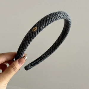 French vintage grey knitted headband with gold logo and soft textured fabric for women